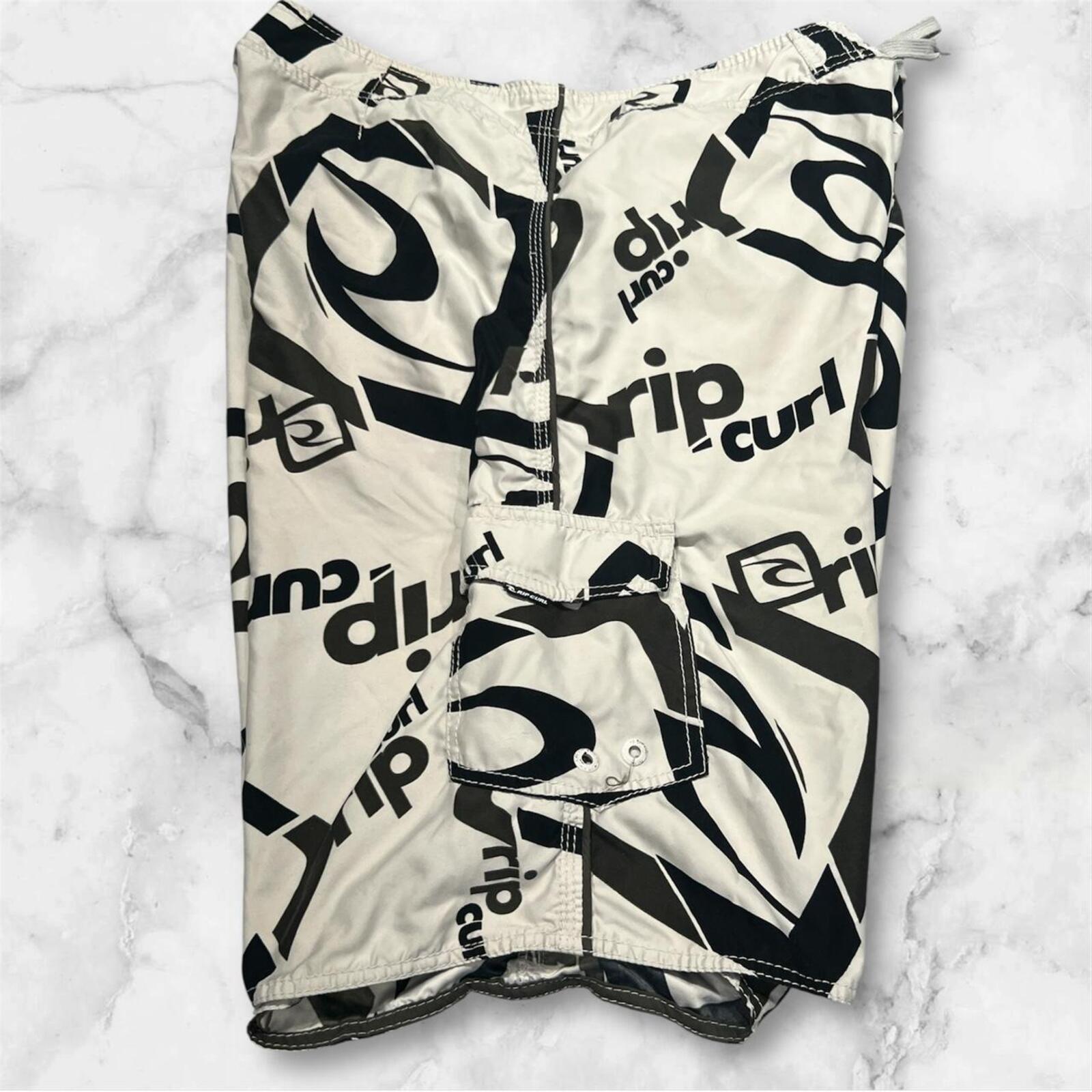 Vintage Rip Curl Surf Men’s Black & White AOP Logo BoardShorts Y2K Size 38”