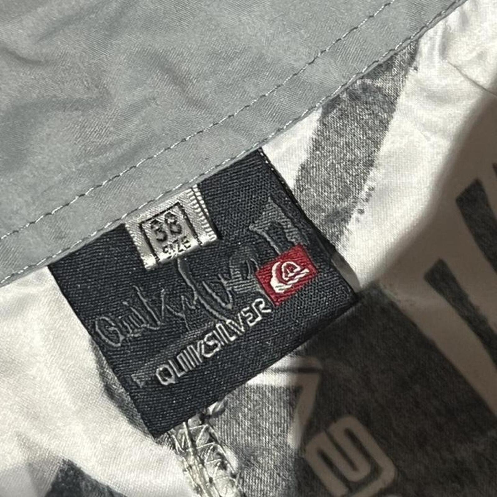 Vintage Quiksilver Surf Black & White AOP Logo BoardShorts Men’s Y2K Size 38”