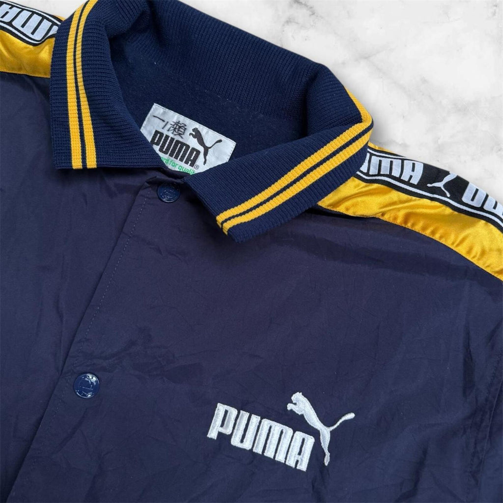 Vintage 1990’s Puma Men’s Navy Blue & Gold Button Up Track Jacket Medium
